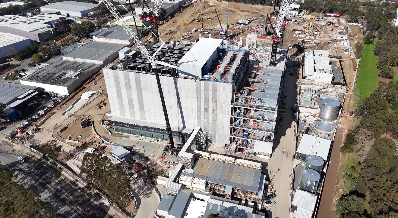 Aerial view of a multi-storey data centre nearing completion